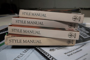 A stack of style manuals. 