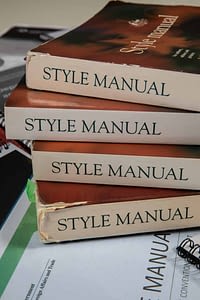 A pile of book that read Style manual on the spine 