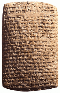 An image taken of Amarna letter EA 161, An Absence Explained. It shows a stone text engraved into the stone. Starting right on the edges. It is from 3,300 years ago and describes  Egyptian diplomacy.  